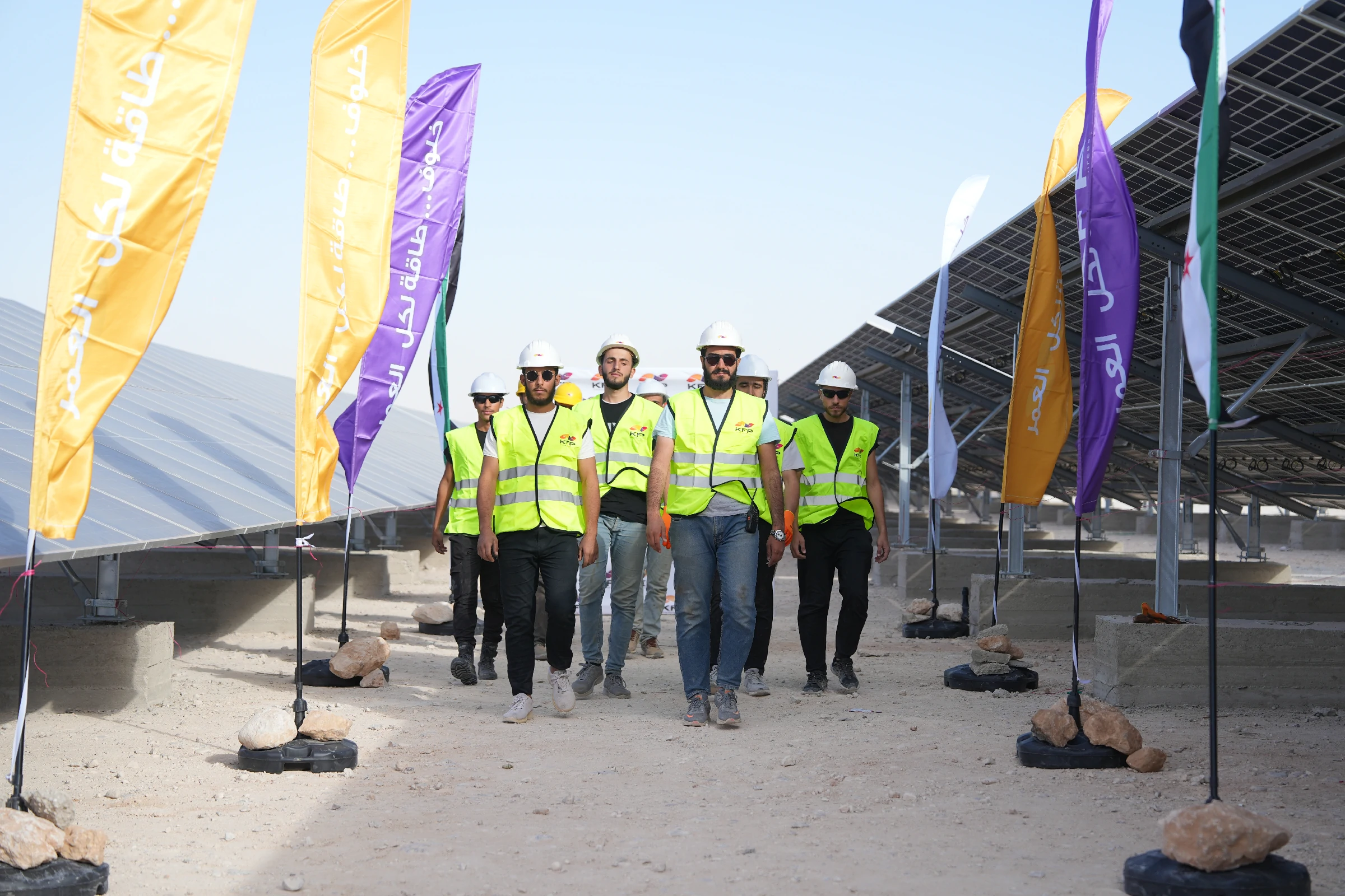 Engineer inspecting a rooftop solar PV installation