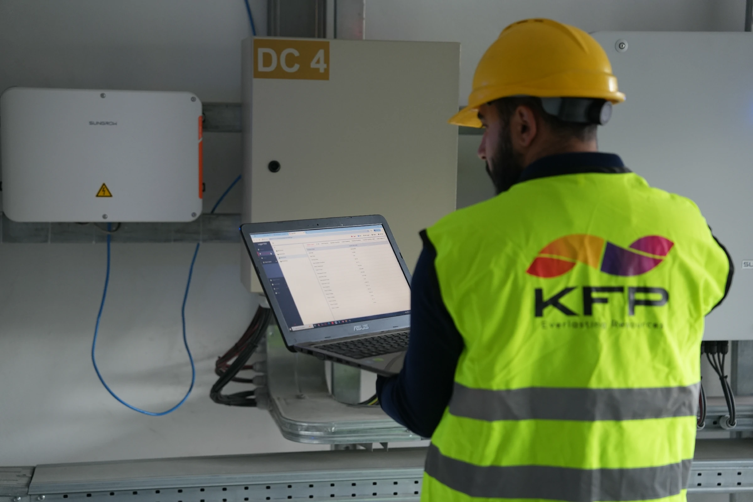 Engineers reviewing detailed project blueprints during system engineering