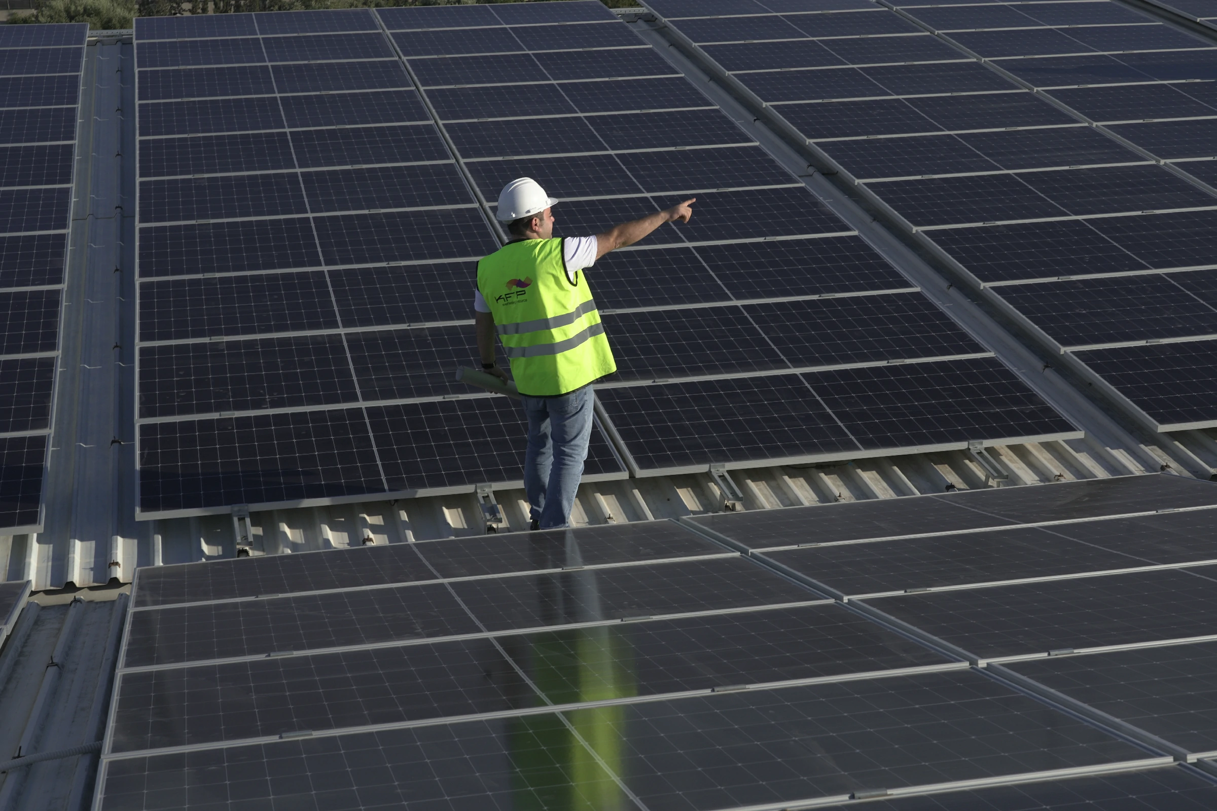 Solar engineers reviewing site and project requirements during assessment